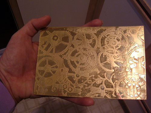 gears etching China on brass